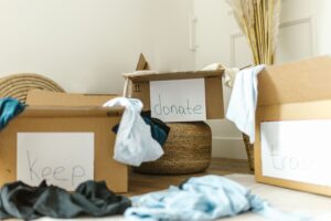 decluttering the space, cleaning, boxes